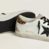 Super-Star da donna con stella nera glitterata e linguetta sul tallone in pelle di pony con stampa leopardata