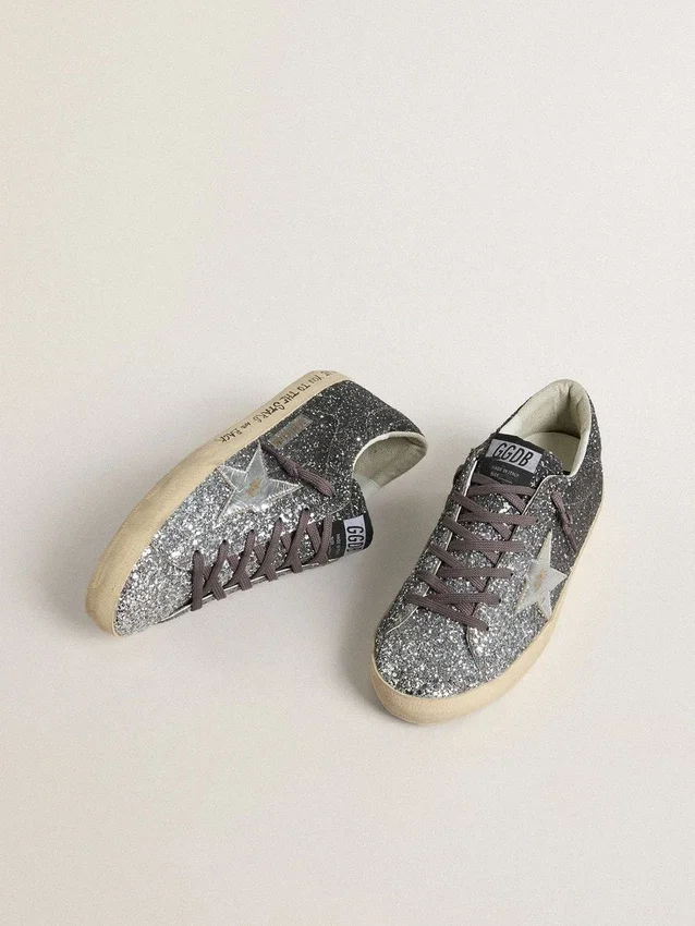 Super-Star da donna con tomaia glitterata e stella in pelle metallizzata argento