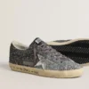 Super-Star da donna con tomaia glitterata e stella in pelle metallizzata argento