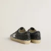 Super-Star da donna con tomaia glitterata e stella in pelle metallizzata argento