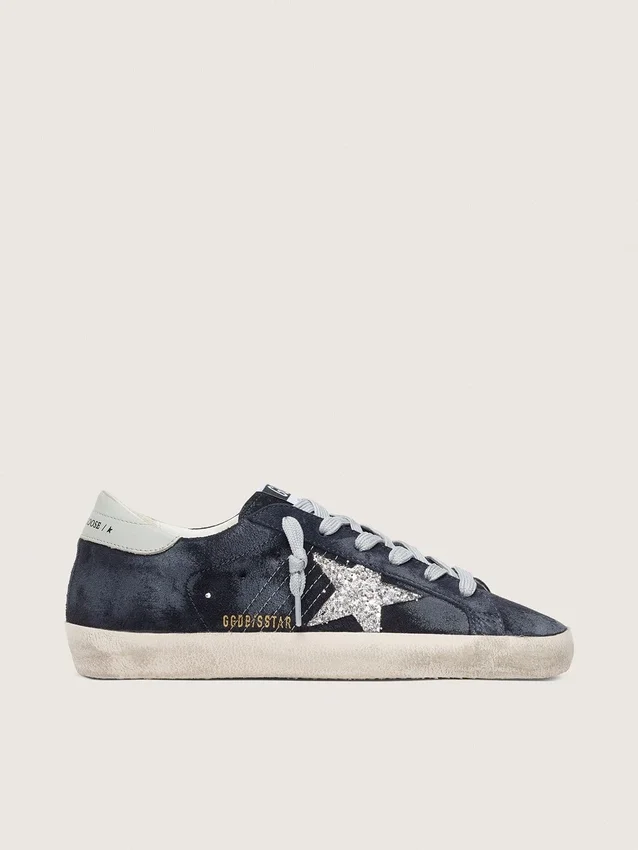 Super-Star da donna in camoscio blu con stella glitterata argento e linguetta in pelle sul tallone