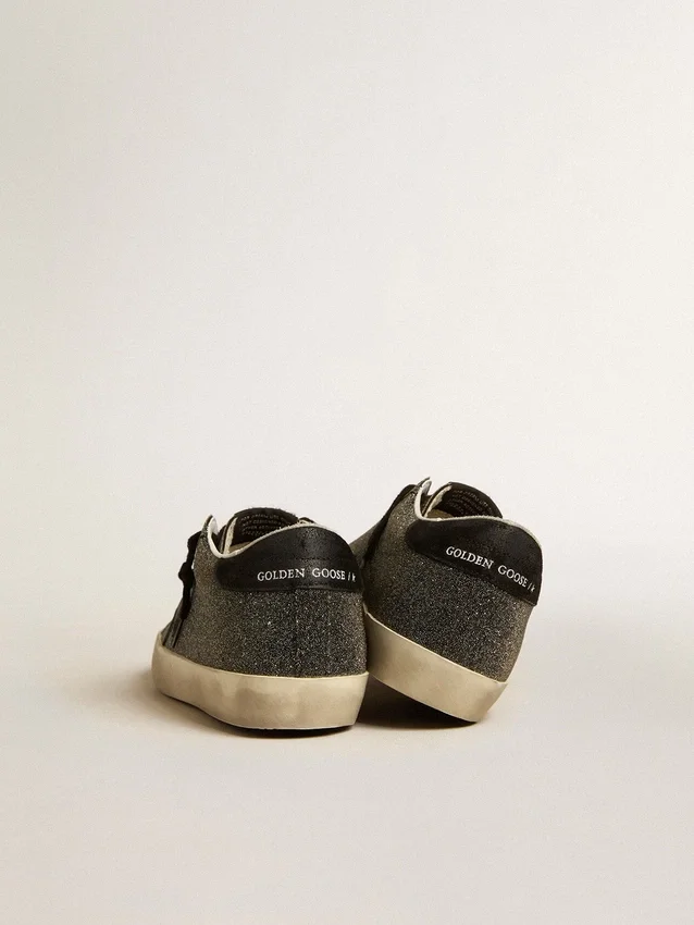 Super-Star da donna in cristalli Swarovski neri con stella in pelle scamosciata nera