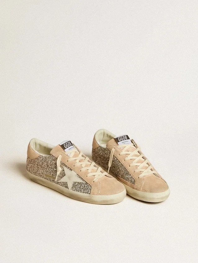 Super-Star da donna in glitter argento con stella in pelle e linguetta sul tallone