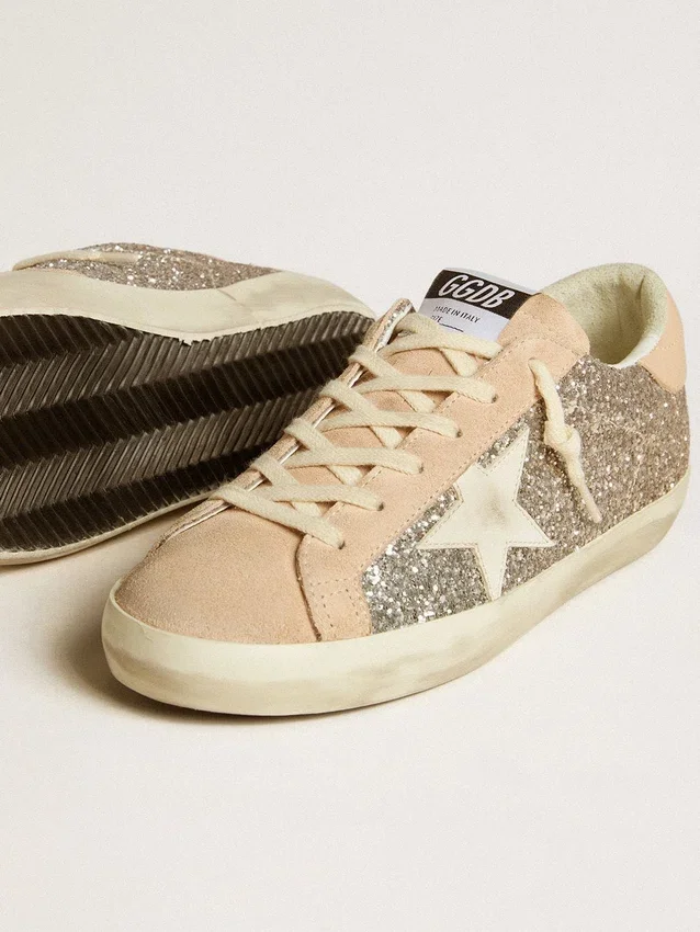 Super-Star da donna in glitter argento con stella in pelle e linguetta sul tallone