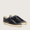 Super-Star da donna in glitter nero con stella in pelle scamosciata nera e inserti in pelle