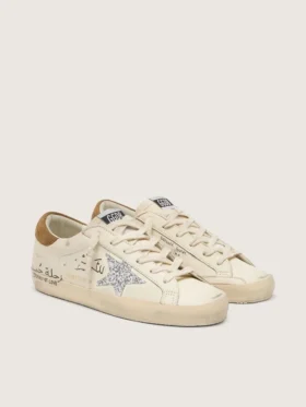 Super-Star da donna in nappa con stella glitterata argento e scritte su tutta la superficie