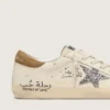 Super-Star da donna in nappa con stella glitterata argento e scritte su tutta la superficie