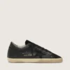 Super-Star da donna in nappa nera con stella nera e linguetta sul tallone glitterata