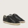 Super-Star da donna in nappa nera con stella nera e linguetta sul tallone glitterata