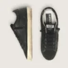 Super-Star da donna in nappa nera con stella nera e linguetta sul tallone glitterata