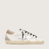 Super-Star da donna in pelle bianca con linguetta sul tallone glitterata