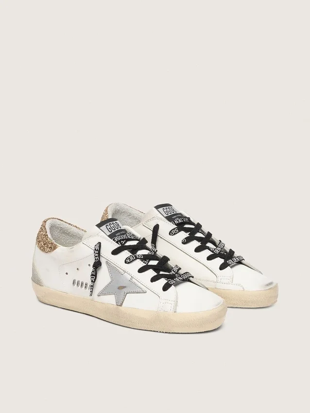 Super-Star da donna in pelle bianca con linguetta sul tallone glitterata