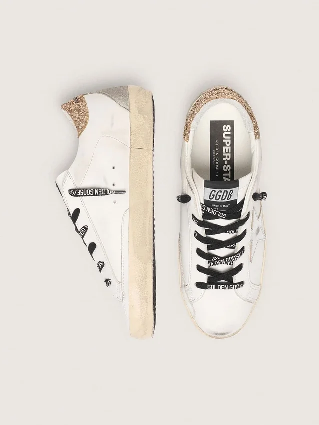 Super-Star da donna in pelle bianca con linguetta sul tallone glitterata