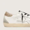 Super-Star da donna in pelle bianca con linguetta sul tallone glitterata