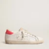 Super-Star da donna in pelle bianca con stella traforata e linguetta sul tallone in nylon fucsia