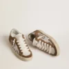 Super-Star da donna in pelle di cavallino con stampa zebrata, stella in pelle e inserti in pelle scamosciata marrone