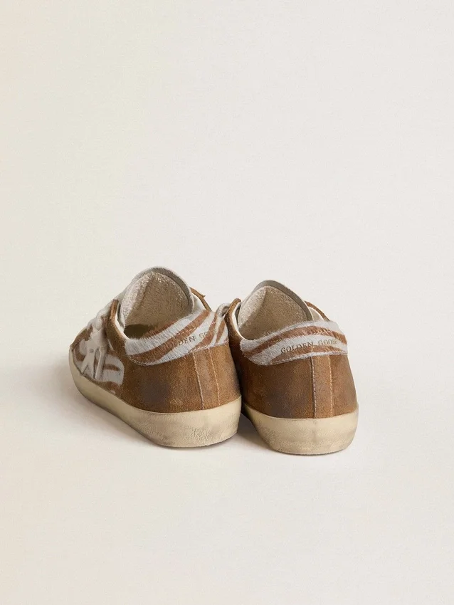 Super-Star da donna in pelle di cavallino con stampa zebrata, stella in pelle e inserti in pelle scamosciata marrone