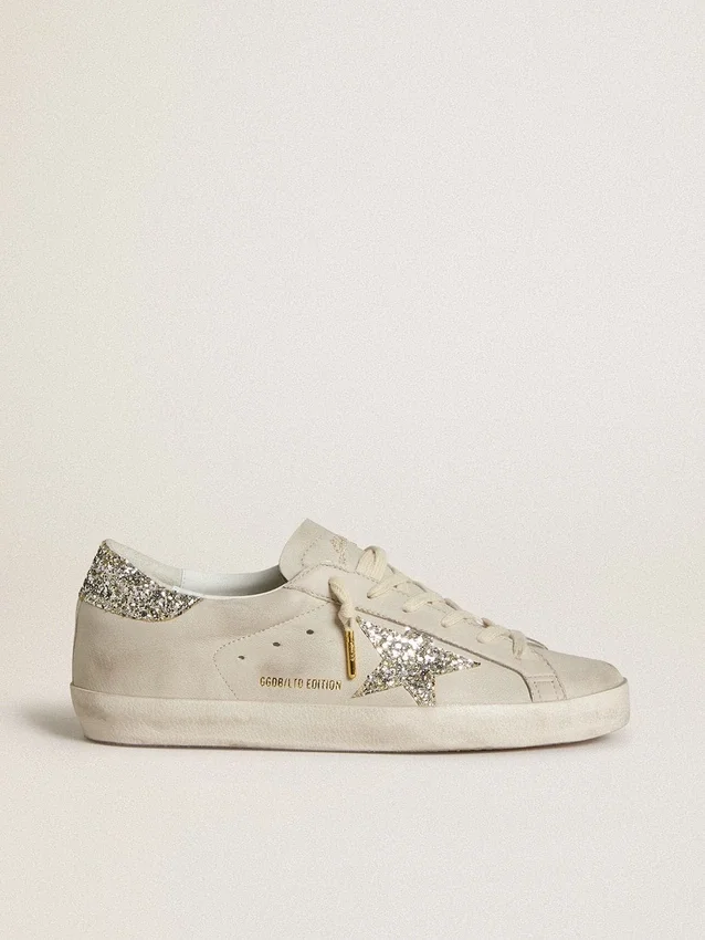 Super-Star da donna in pelle nappa avorio con stella glitterata platino e linguetta sul tallone