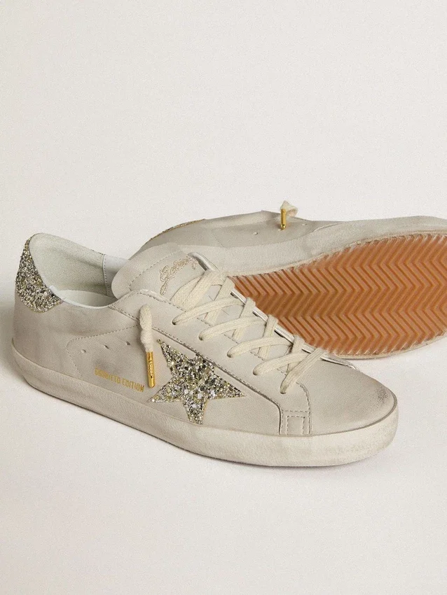 Super-Star da donna in pelle nappa avorio con stella glitterata platino e linguetta sul tallone