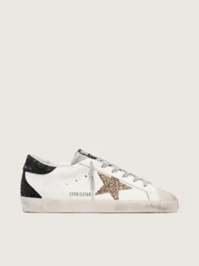 Super-Star da donna in pelle nappa con stella glitterata dorata e linguetta sul tallone nera glitterata