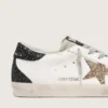 Super-Star da donna in pelle nappa con stella glitterata dorata e linguetta sul tallone nera glitterata