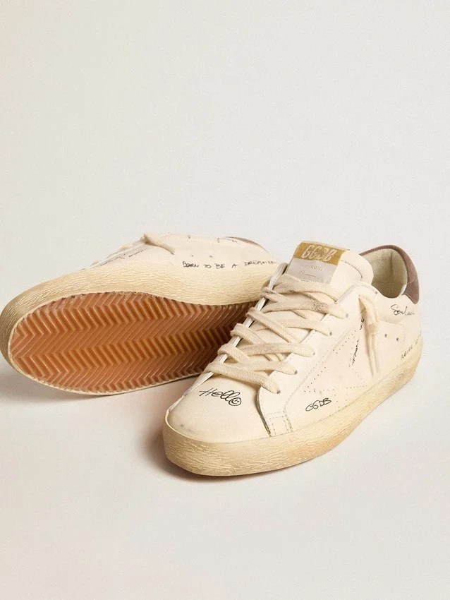 Super-Star da donna in pelle nappa con stella traforata e linguetta sul tallone in pelle scamosciata