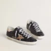 Super-Star da donna in pelle nappa nera con stella in pelle di pony con stampa zebrata e linguetta sul tallone in pelle beige