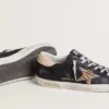 Super-Star da donna in pelle nappa nera con stella in pelle di pony con stampa zebrata e linguetta sul tallone in pelle beige