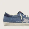 Super-Star da donna in pelle scamosciata blu denim con stella argentata glitterata