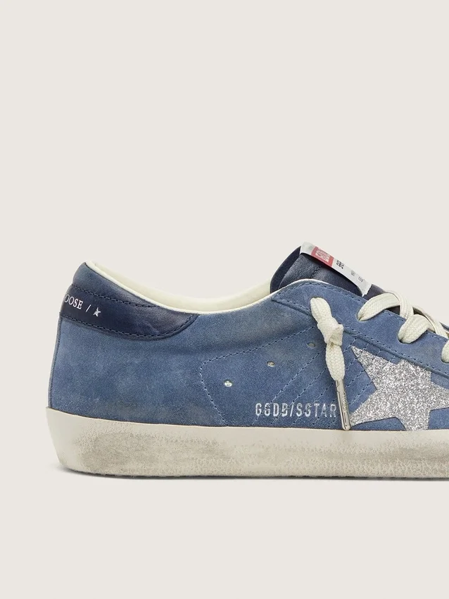 Super-Star da donna in pelle scamosciata blu denim con stella argentata glitterata