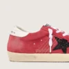 Super-Star da donna in pelle scamosciata rossa con stella glitterata e linguetta bianca sul tallone