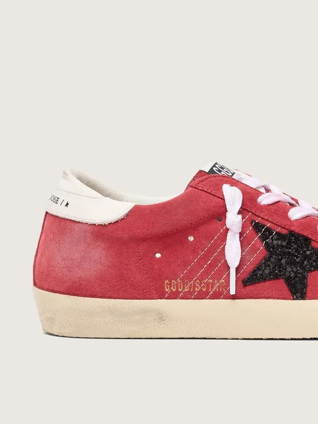 Super-Star da donna in pelle scamosciata rossa con stella glitterata e linguetta bianca sul tallone