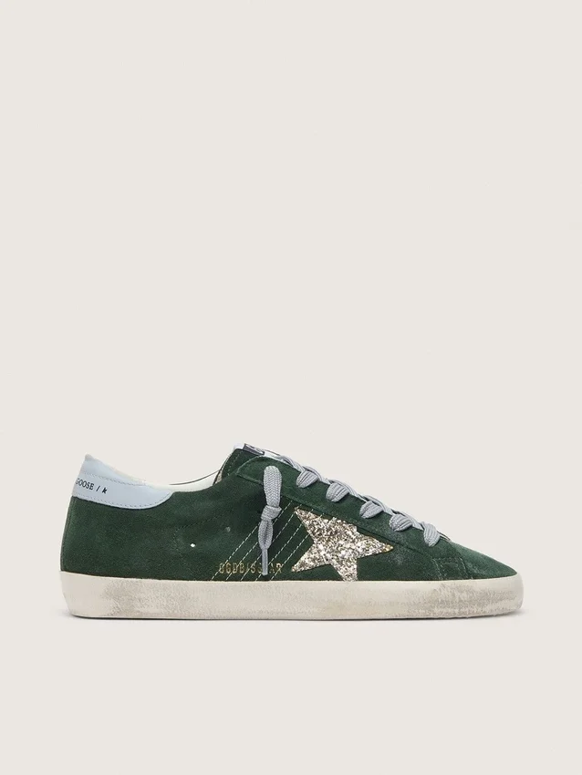 Super-Star da donna in pelle scamosciata verde, con stella glitterata argento e linguetta in pelle sul tallone