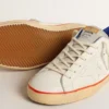 Super-Star da uomo con stella traforata e linguetta sul tallone in pelle scamosciata blu