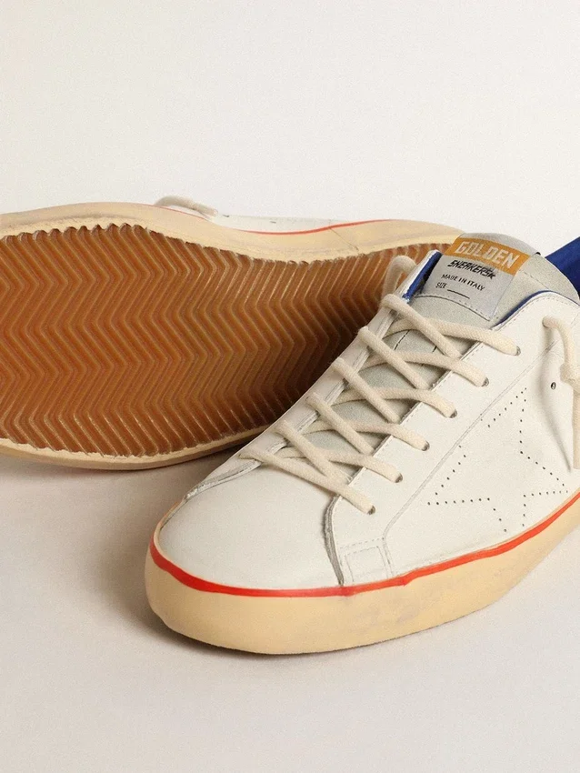 Super-Star da uomo con stella traforata e linguetta sul tallone in pelle scamosciata blu