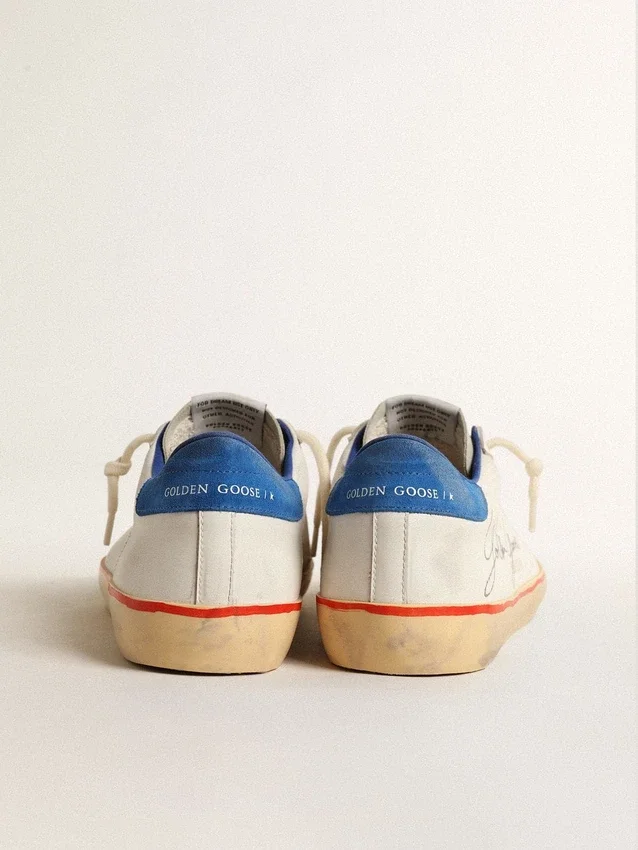 Super-Star da uomo con stella traforata e linguetta sul tallone in pelle scamosciata blu