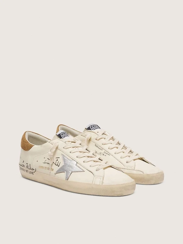 Super-Star da uomo in nappa con stella argentata metallizzata e scritte su tutta la superficie