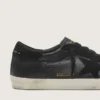 Super-Star da uomo in nappa nera con stella e linguetta sul tallone in pelle scamosciata nera