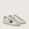 Super-Star da uomo in pelle bianca con stella in nabuk nero e linguetta sul tallone in pelle metallizzata argento