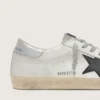 Super-Star da uomo in pelle bianca con stella in nabuk nero e linguetta sul tallone in pelle metallizzata argento