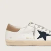 Super-Star da uomo in pelle bianca con stella in tela blu notte e linguetta sul tallone in pelle color tabacco