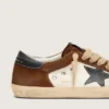 Super-Star da uomo in pelle bianca e pelle scamosciata marrone con stella in pelle nera