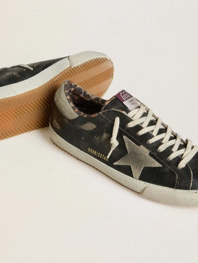 Super-Star da uomo in pelle nera con stella in pelle scamosciata grigia e linguetta sul tallone