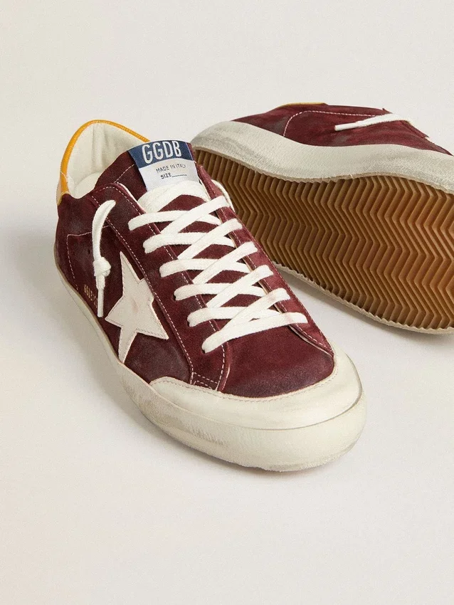 Super-Star da uomo in pelle scamosciata rosso mattone con stella in pelle bianca e linguetta sul tallone con stampa animalier