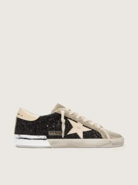 Super-Star in glitter nero con stella color crema e inserti in pelle scamosciata