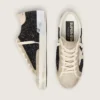 Super-Star in glitter nero con stella color crema e inserti in pelle scamosciata