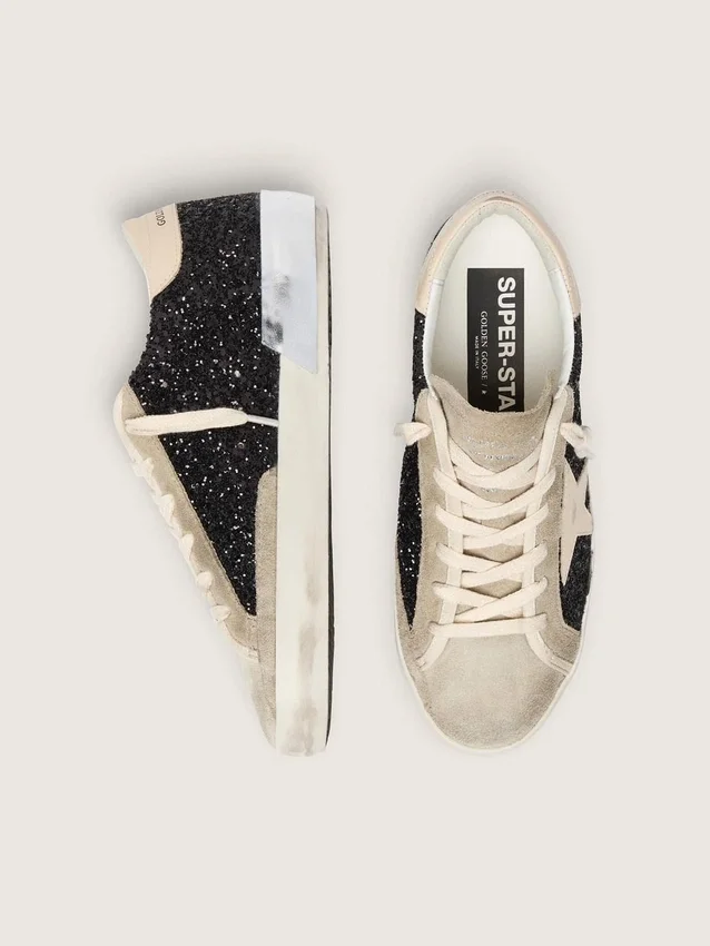 Super-Star in glitter nero con stella color crema e inserti in pelle scamosciata