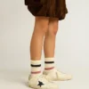 Super-Star Junior in pelle con stella glitterata e linguetta sul tallone