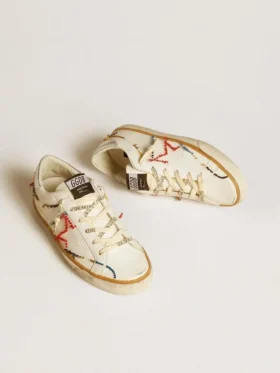 Super-Star LTD da donna con stella traforata e linguetta sul tallone in pelle metallizzata