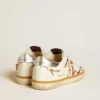 Super-Star LTD da donna con stella traforata e linguetta sul tallone in pelle metallizzata